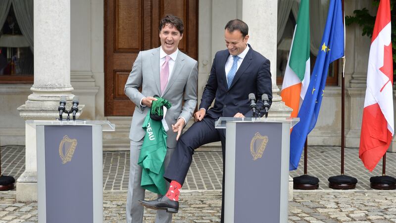 Darned funny: Taoiseach Leo Varadkar shows Canadian prime minister Justin Trudeau his socks. Photograph: Dara Mac Donaill
