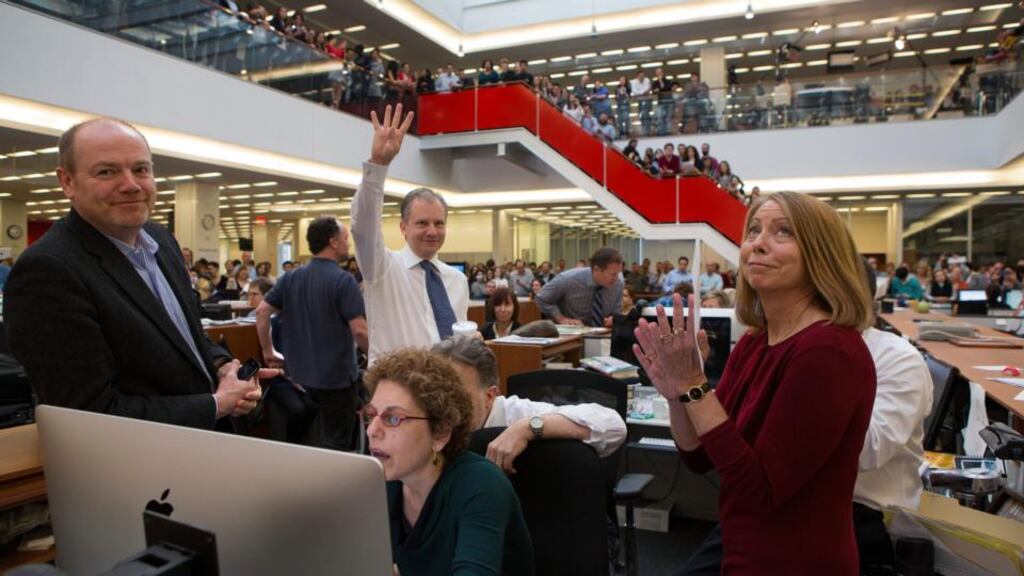 The New York Times publisher Arthur Sulzberger Jr, center, and Jill Abramson, right, who was sacked as editor of the New York Times last week, celebrate the four Pulitzers won by The Times in 2013. File photograph: Ruth Fremson/The New York Times
