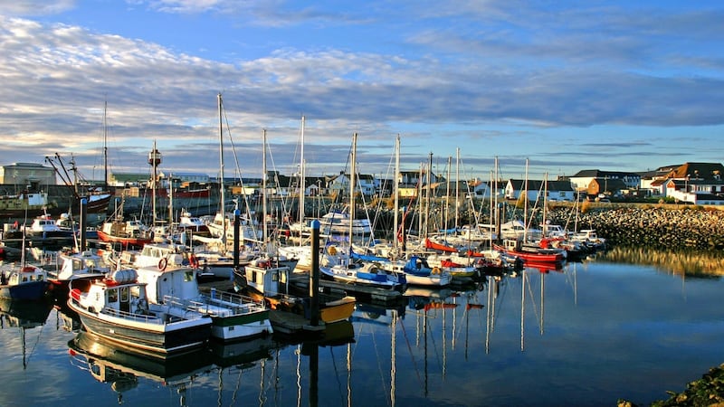Kilmore Quay Harbour. There are a couple of traditional thatched cottages in the area starting from €179,500