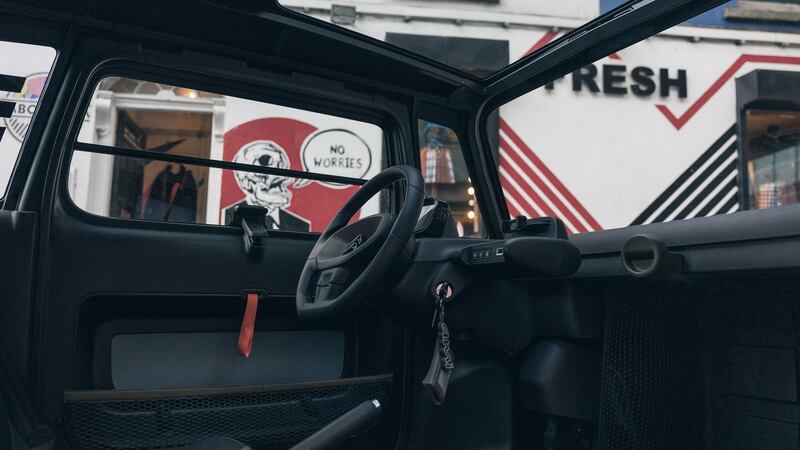 The cabin is basically a plastic bucket, and every bit as noisy as that sounds. Photo: Paddy McGrath