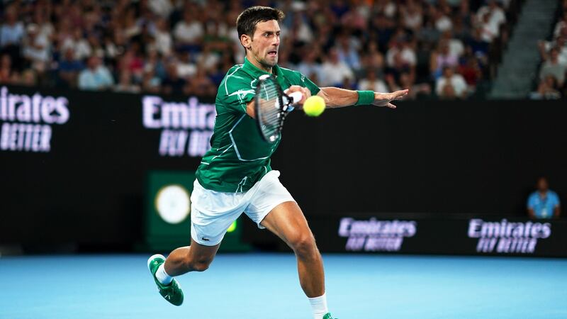 Djokovic returns a forehand. Photo: Michael Dodge/EPA