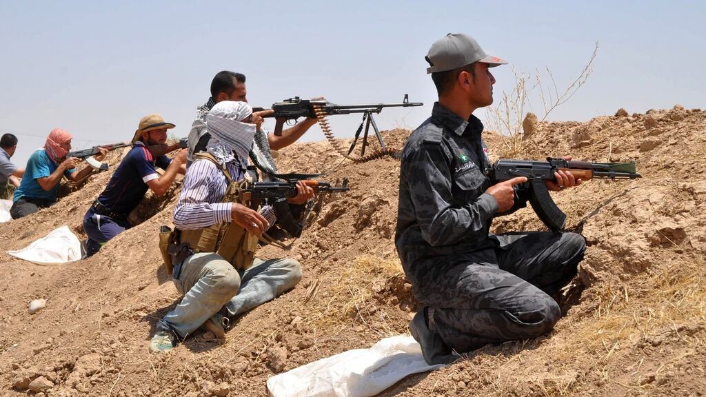 Iraqi Shia Turkmen fighters take part in an intensive security deployment in the town of Taza, south of the northern oil city of Kirkuk. Photograph: Reuters/stringer