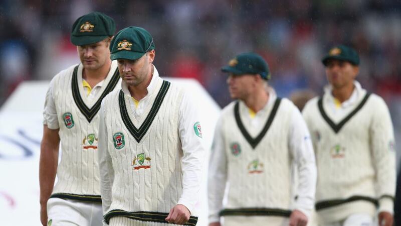 Michael Clarke and Shane Watson of Australia leave the ground after rain stopped play during day five of the 3rd Investec Ashes Test match between England and Australia at Emirates Old Trafford Cricket Ground. Photograph: Ryan Pierse/Getty Images