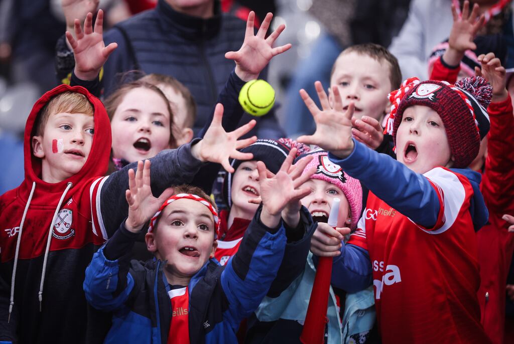 Watergrasshill fans attempt to catch a match sliotar during the All-Ireland club IHC final at Croke Park against Tynagh/AbbeyDuniry. Photograph: Tom Maher/Inpho