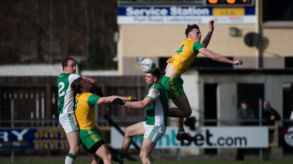 Donegal’s Jason McGee challenges for the ball in the air. Photo: Evan Logan/Inpho