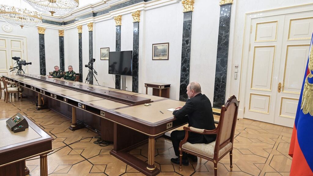 Russian president Vladimir Putin at a meeting with his defence minister Sergei Shoigu and chief of the general staff Valery Gerasimov in Moscow on Sunday. Photograph: Alexey Nikolsky/Sputnik/AFP via Getty Images