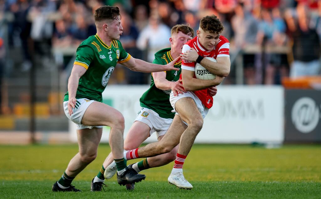 Louth’s Adam Gillespie and Fiach Hartigan of Meath in the Leinster Under-20 football final in Newbridge on Wednesday. Photograph: Ryan Byrne/Inpho