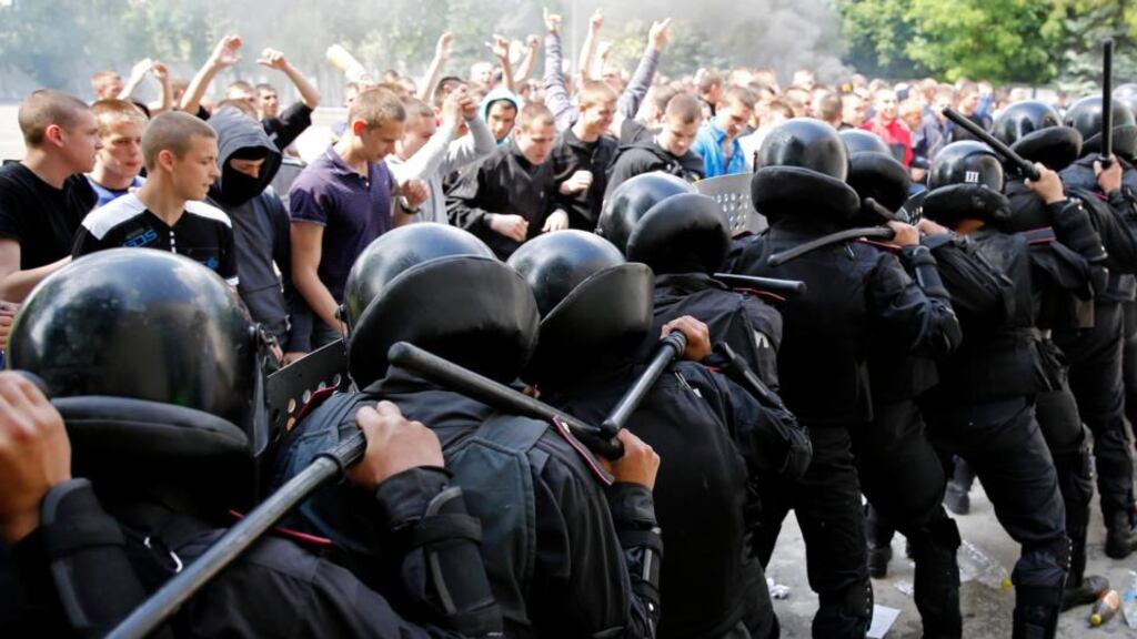 Members of the Interior Ministry, the National Guard and other Ukrainian security services take part in a drill to resist and prevent mass unrest in Odessa today. Russian president Vladimir Putin has ordered military forces to return to their permanent bases after drills in three regions bordering Ukraine, the Kremlin said. Photograph: Yevgeny Volokin/Reuters