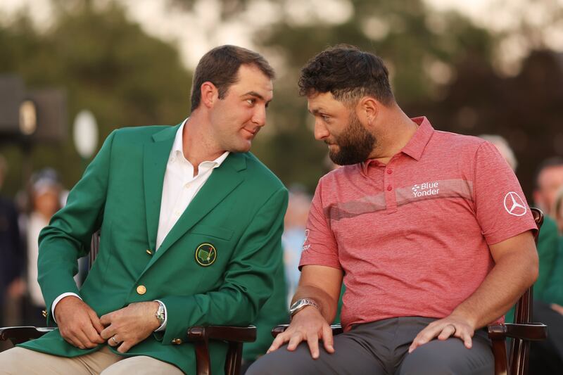 2022 Masters Champion Scottie Scheffler of the United States with Jon Rahm of Spain during the Green Jacket Ceremony. Photograph: Christian Petersen/Getty Images