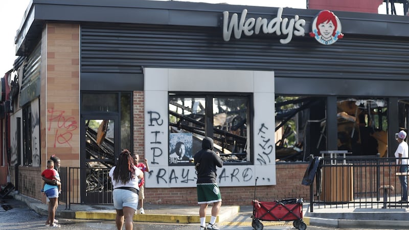 The Wendy’s restaurant, where Rayshard Brooks was shot, was destroyed after being set fire. Photograph: Erik S. Lesser/ EPA