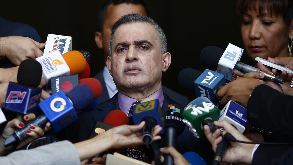 Venezuela’s general prosecutor, Tarek William Saab, speaks to reporters in Caracas on Tuesday. Photograph: Marco Bello/Getty Images