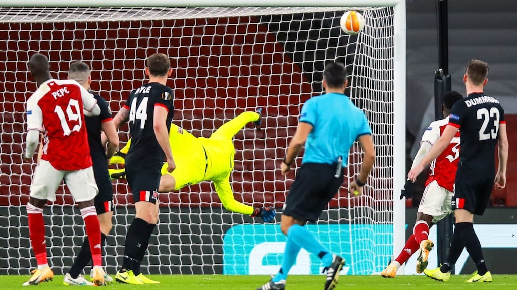 Arsenal’s Nicolas Pépé scores their third goal past Dundalk goalkeeper Gary Rogers during the Europa League Group B match at the Emirates Stadium. Photo: Tommy Dickson/Inpho