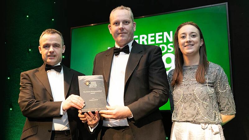 Barry Murphy, Commercial Director, Naturgy presents The Green Pharmaceutical Award to Louis Collins & Megan Staunton, Astellas Ireland.