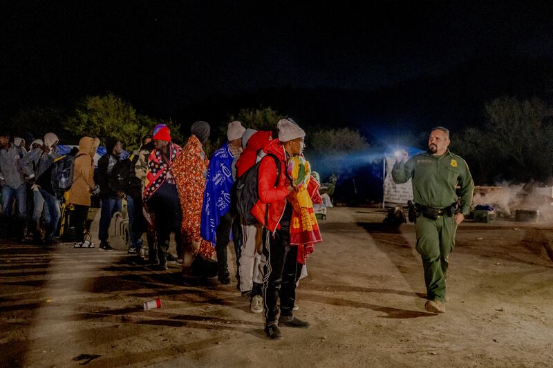 Migrants who were taken in for processing by border patrol agents in Sásabe, Arizona, on Tuesday. Photograph: Fred Ramos/New York Times