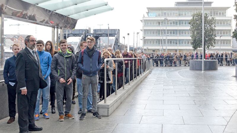 Delegates queue up to attend the opening day of the Dublin Tech Summit. Photograph: Barbara Lindberg.