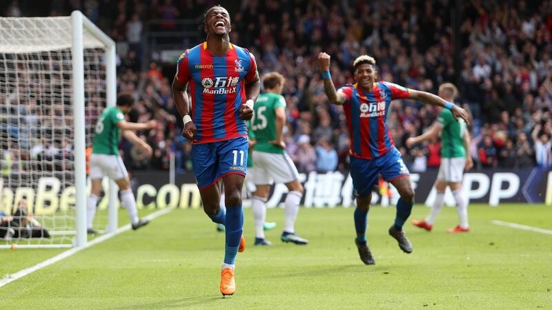 Wilfried Zaha scores Crystal Palace’s opener against West Brom. Photograph: Christopher Lee/Getty