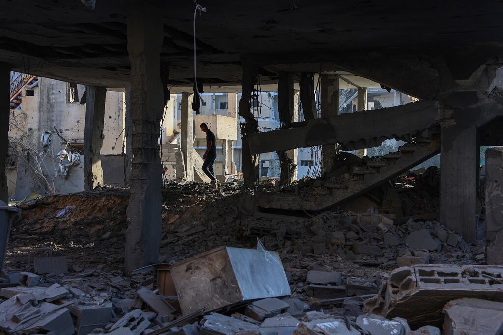 A man inspects damage around a house hit in an Israeli strike in Beit Lahia in the northern Gaza Strip. Photograph: Omar Al-Qattaa/AFP