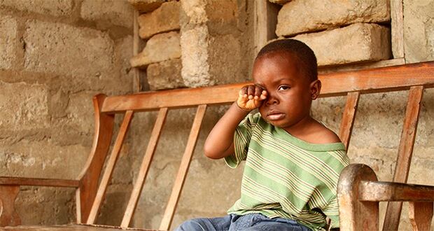 Enoch was just two years old when he was blinded by cataract and struggled even to take a few steps on his own. Photo: Zul Mukhida. Copyright: Sightsavers