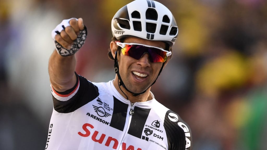 Australia’s Michael Matthews celebrates as he crosses the finish line at the end of the 14th stage of the  Tour de France  between Blagnac and Rodez. Photograph: Lionel Bonaventure/AFP/Getty Images