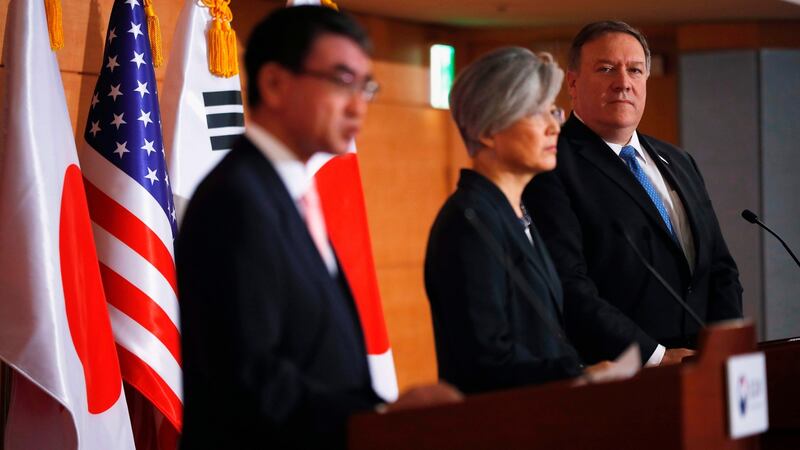 Mike Pompeo with South Korea’s foreign minister Kang Kyung-wha (centre) and Japan’s foreign minister Taro Kono at a joint news conference in Seoul. Photograph: Kim Hong-Ji/AFP/Getty Images