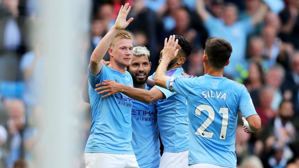 Manchester City celebrate after Sergio Aguero makes it 2-0 against Brighton. Photograph: Nigel Roddis/EPA