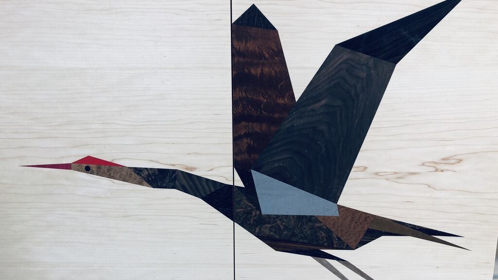 Detail of heron cabinet crafted by Noel Whelan.