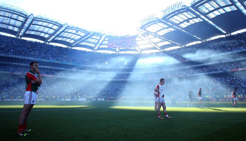 All-Ireland Final Mayo vs Dublin, 2013: Dejected Mayo player's backlit in the moment at the final whistle. Photograph: Inpho