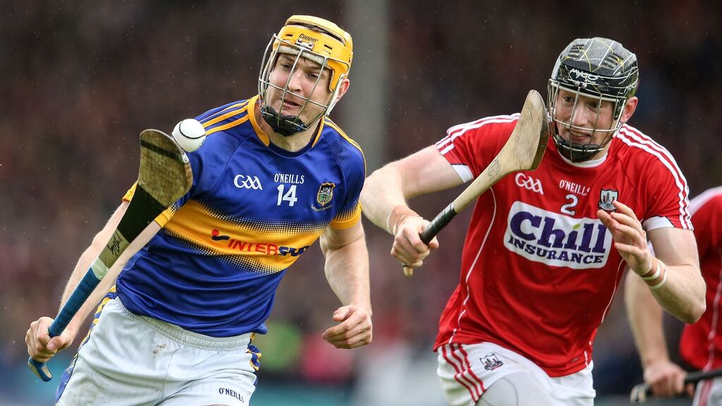 Tipperary’s Séamus Callanan takes on Cork’s Damian Cahalane during last year’s Munster championship meeting. Photograph: Cathal Noonan/Inpho