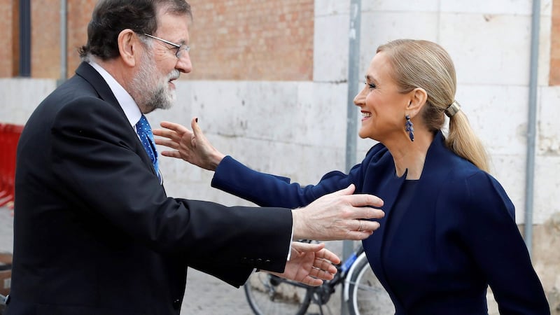 Spanish prime minister Mariano Rajoy greets the president of Madrid’s regional government Cristina Cifuentes at the Alcala de Henares University, near Madrid, earlier this week. She resigned from the presidency on Wednesday. Photograph: Juan Carlos Hidalgo/AFP/Getty Images