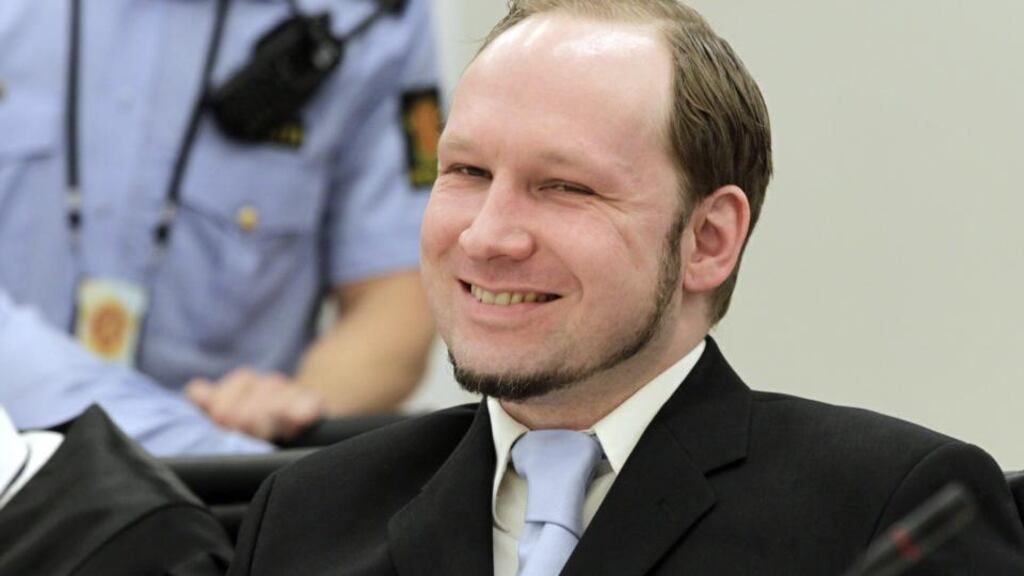 Norwegian far-right mass killer Anders Behring Breivik smiles in court while the prosecutors deliver their closing arguments in Oslo in 2012. Photograph: Reuters/Berit Roald/NTB Scanpix