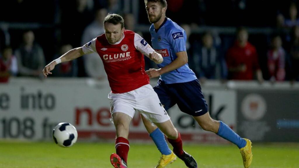 Conan Byrne of St Patrick’s Athletic scores his side’s second goal against UCD last night. Photograph: Inpho