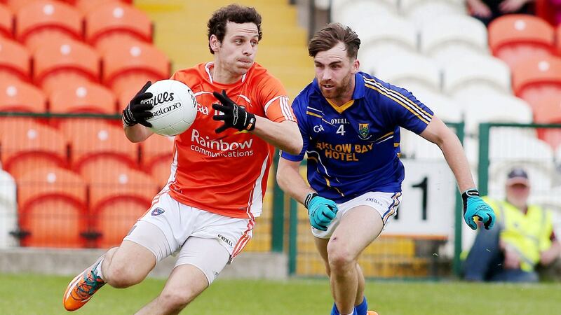 Clarke with Wicklow’s Aaron Murphy the last time he played championship football in 2015. Photo: Inpho