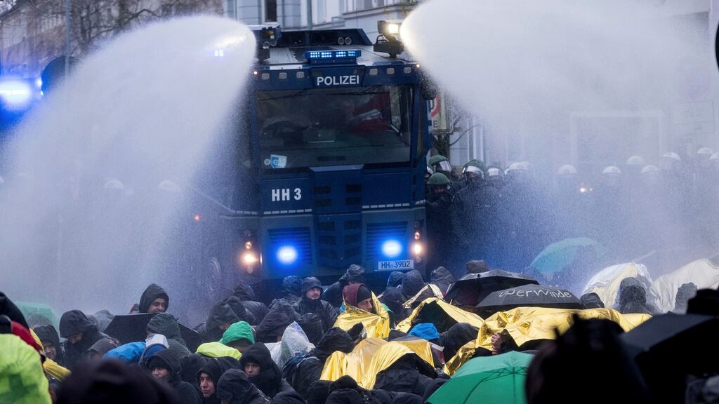 Police use a water cannon to clear a street that is blocked by demonstrators near the congress centre where the party convention of the Alternative for Germany, AfD, is held in Hannover, Germany, on December 2nd 2017. Photograph: Peter Steffen/dpa via AP