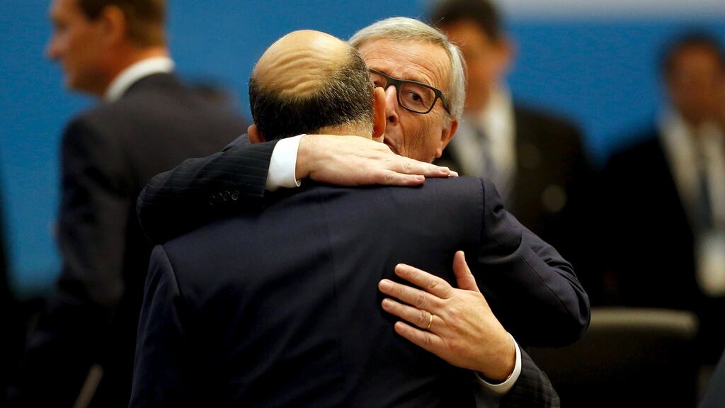 European Commission president Jean-Claude Juncker  embraces  European Commissioner for Economic and Financial Affairs Pierre Moscovici before a moment of silence for  victims of the Paris attacks at the  G20 summit  in Antalya, Turkey. Photograph: Jonathan Ernst/Reuters