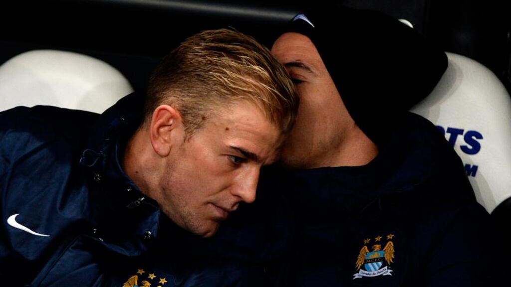 Manchester City’s goalkeeper Joe Hart talks with Samir Nasri on the bench ahead of their English League Cup fourth round soccer match against Newcastle United at St James’ Park. Photograph: Nigel Roddis/Reuters