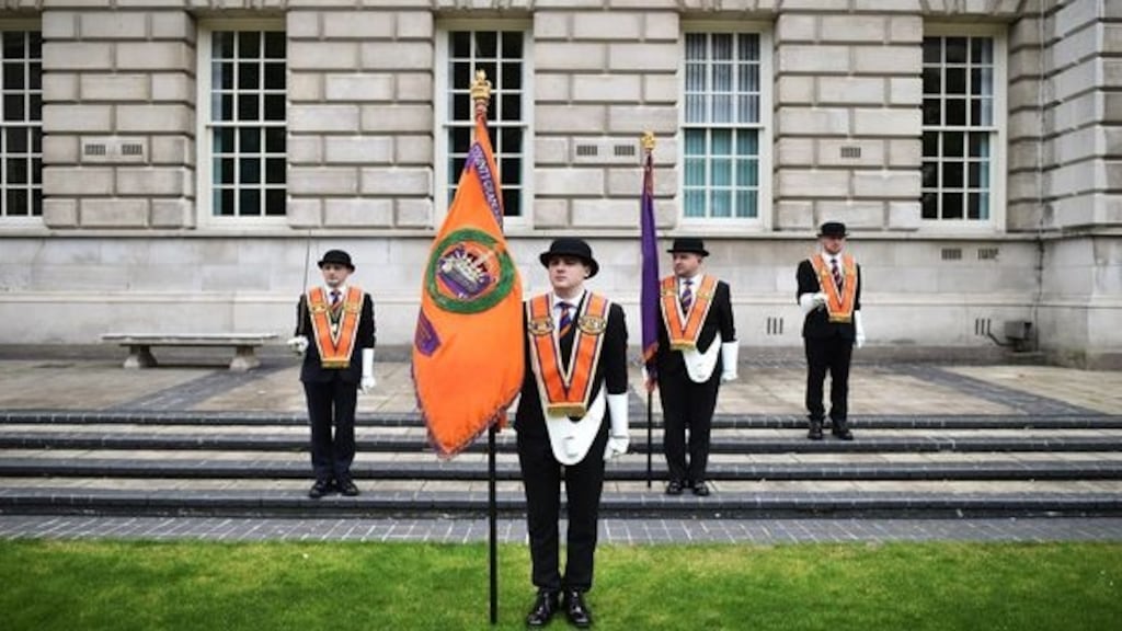 Orange men take part in a wreath-laying ceremony at Belfast City Hall. Photograph: Getty