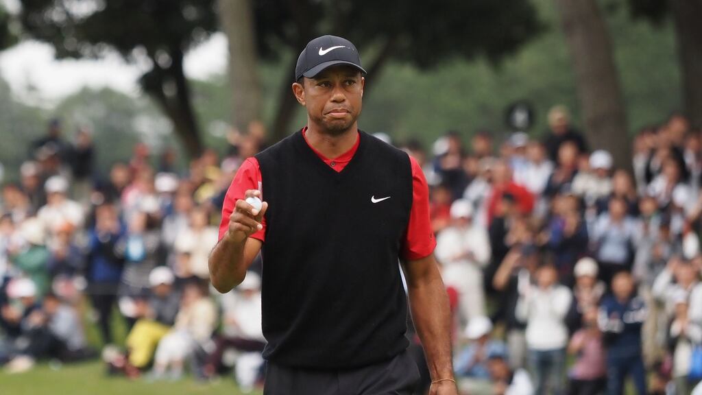 Tiger Woods leads by three in Japan. Photograph: Toshifumi Kitamura/AFP/Getty