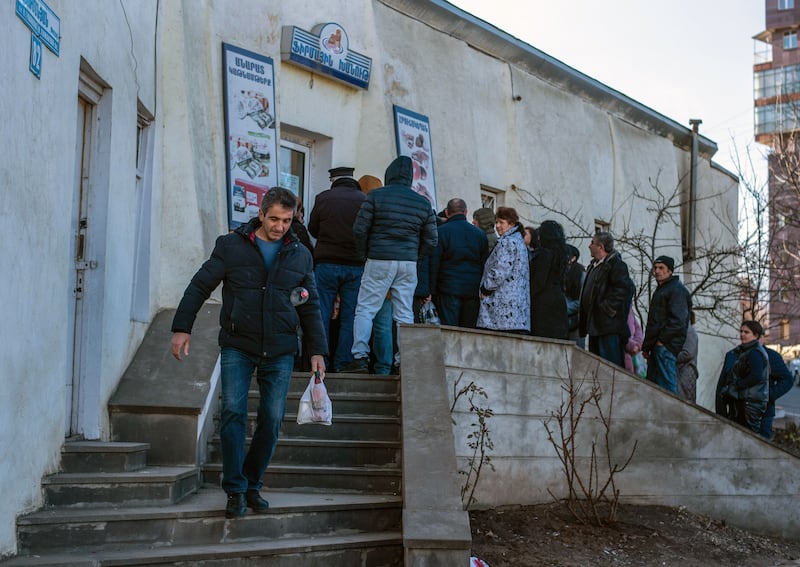 Armenian people queue outside a dairy shop in Stepanakert, the capital of the Nagorno-Karabakh region. Photograph: Davit Ghahramanyan/AFP via Getty Images