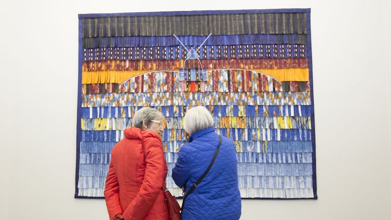 Eva International 2016 viewers admire Abdoulaye Konaté’s tapestry. Photograph: Oisin McHugh Fusion Shooters/EVA International