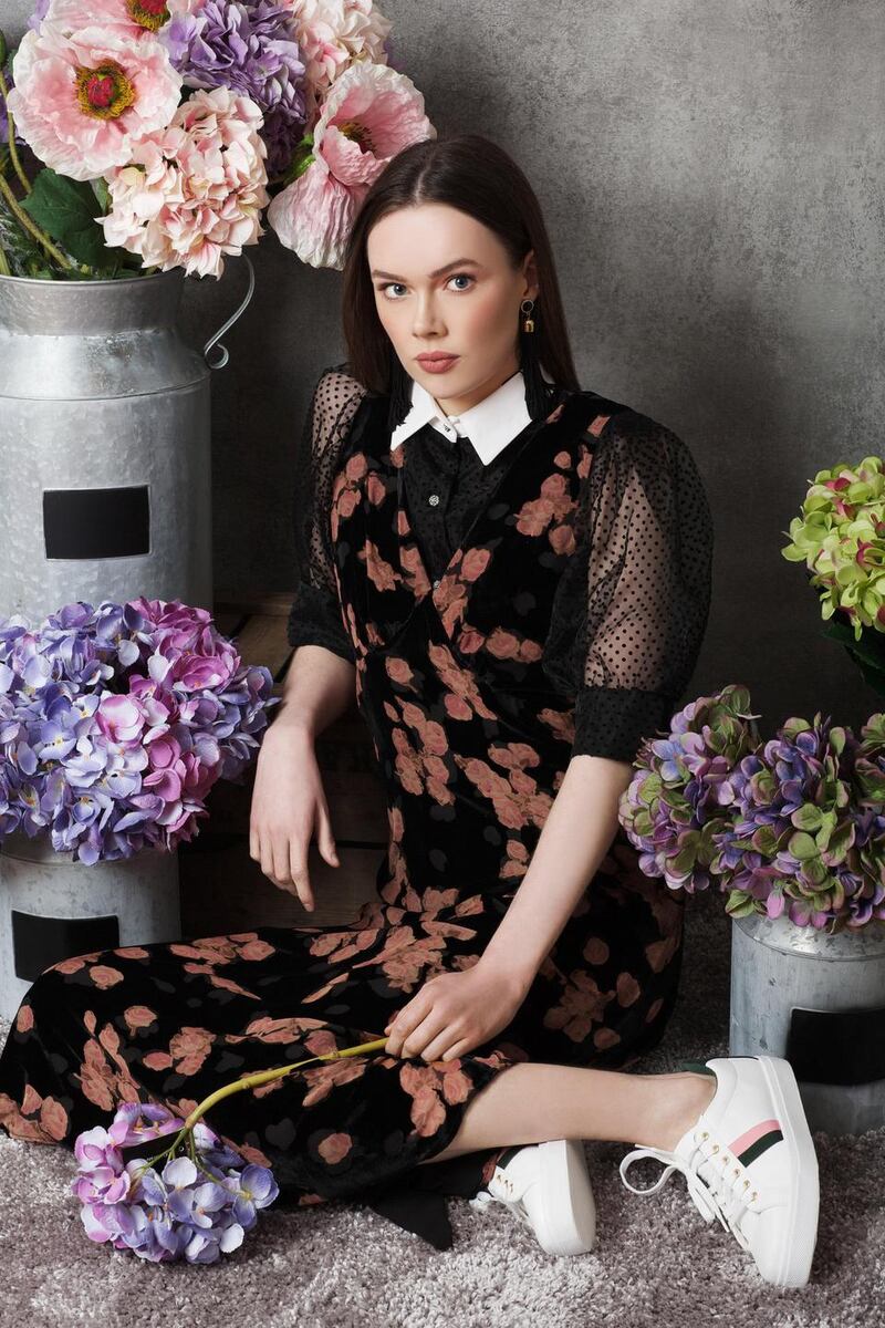 Black blouse €49,.95 Zara, dress €295 Michael Kors, Arnotts, earrings €13 Om Diva, trainers €45 River Island.