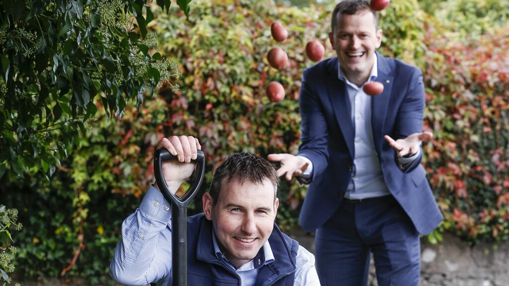 Picking potatoes: James O’Shea, Iverk Produce (L) and Paul Scally, buying director, Aldi Ireland. Photograph: Conor McCabe