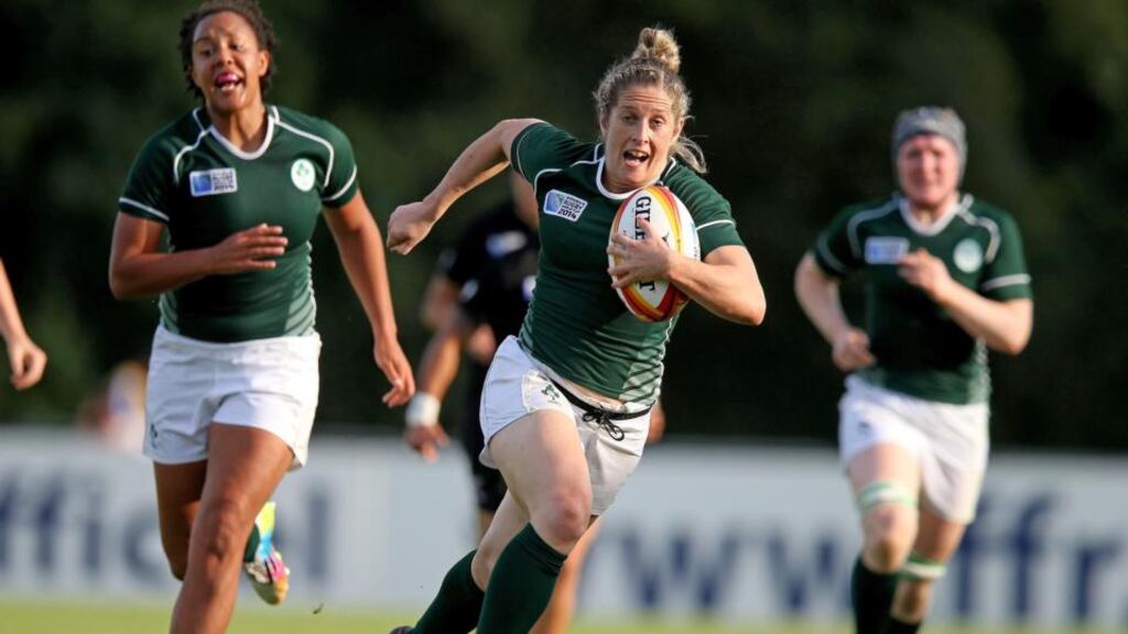 Ireland’s Alison Miller runs in for a try against New Zealand during the Pool B clash at the FFR Headquarters, Marcoussis, Paris. Photograph: Dan Sheridan/Inpho