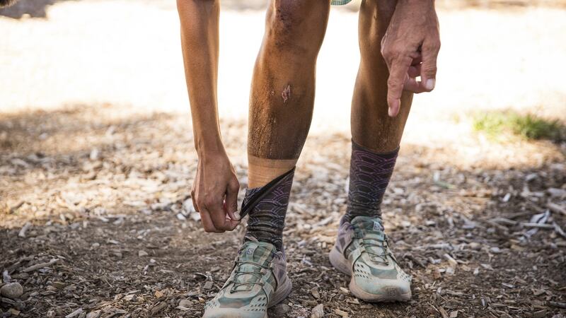 Courtney Dauwalter shows of her “dirt-tan” line after finishing second in the Tahoe 200 ultramarathon.