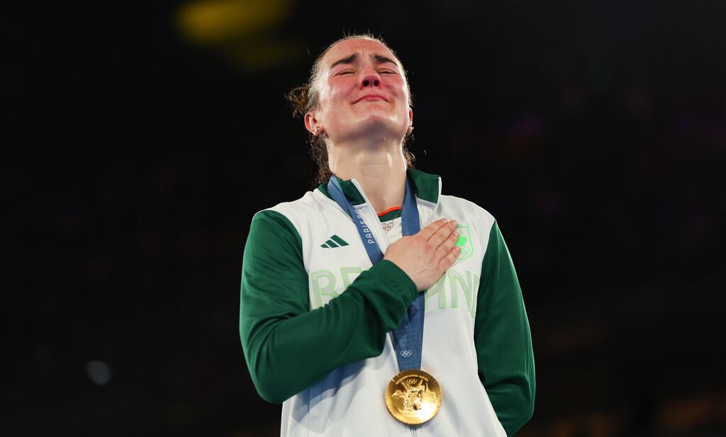 Kellie Harrington on the podium after beating Yang Wenlu to win gold at the Paris Olympics. Photograph: James Crombie/Inpho