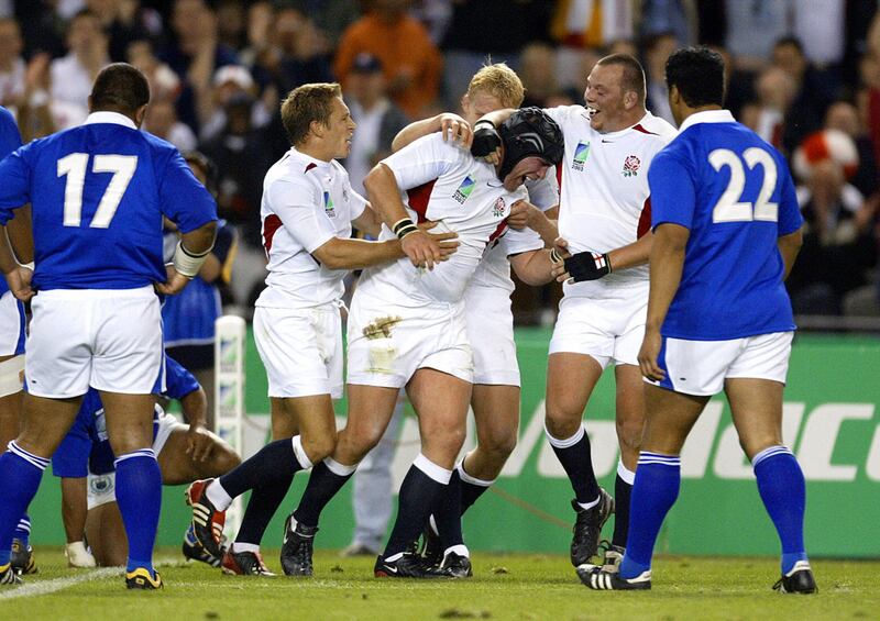 England's prop Phil Vickery is congratulated by his team-mates Jonny Wilkinson and hooker Steve Thompson after scoring a try against Samoa in the 2003 World Cup. Photograph: Greg Wood/AFP