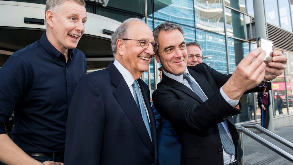 Comedian Patrick Kielty, George Mitchell and actor James Nesbitt take a selfie following an address by the senator at University of Ulster in Belfast. Photograph: Liam McBurney/PA Wire