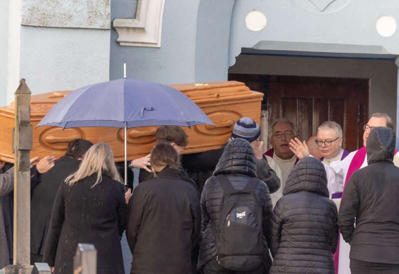 The remains of Thomas Gallagher are carried into St Mary's Church, Ballybrack for his funeral Mass