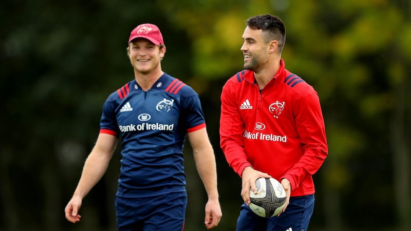 Tyler Bleyendaal and Conor Murray during Munster training ahead of the opening weekend of Champions Cup action. Photo: Ryan Byrne/Inpho