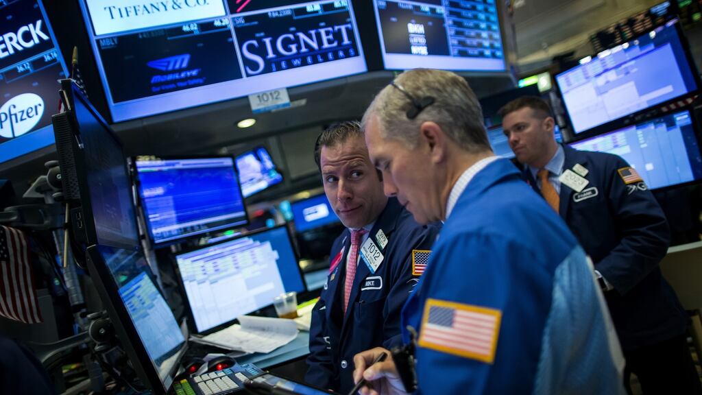 Traders on the floor of the New York Stock Exchange. Microsoft and Morgan Stanley were the latest US companies whose quarterly results topped analysts estimates Photograph: Eric Thayer/Bloomberg