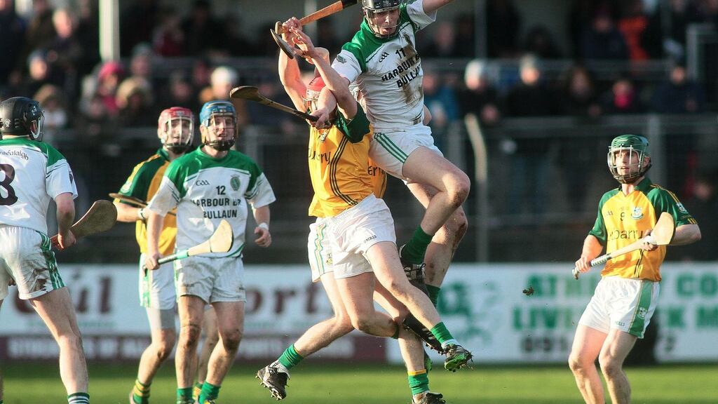 Joseph Cooney of Sarsfields and Niall Healy of Craughwell battle for possession in yesterdays Galway Senior Hurling Championship Final. Photograph: Mike Shaughnessy/Inpho
